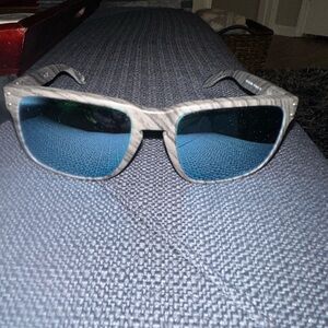 Oakley Sunglasses Blue Lenses with Grey Wood-Pattern Frame